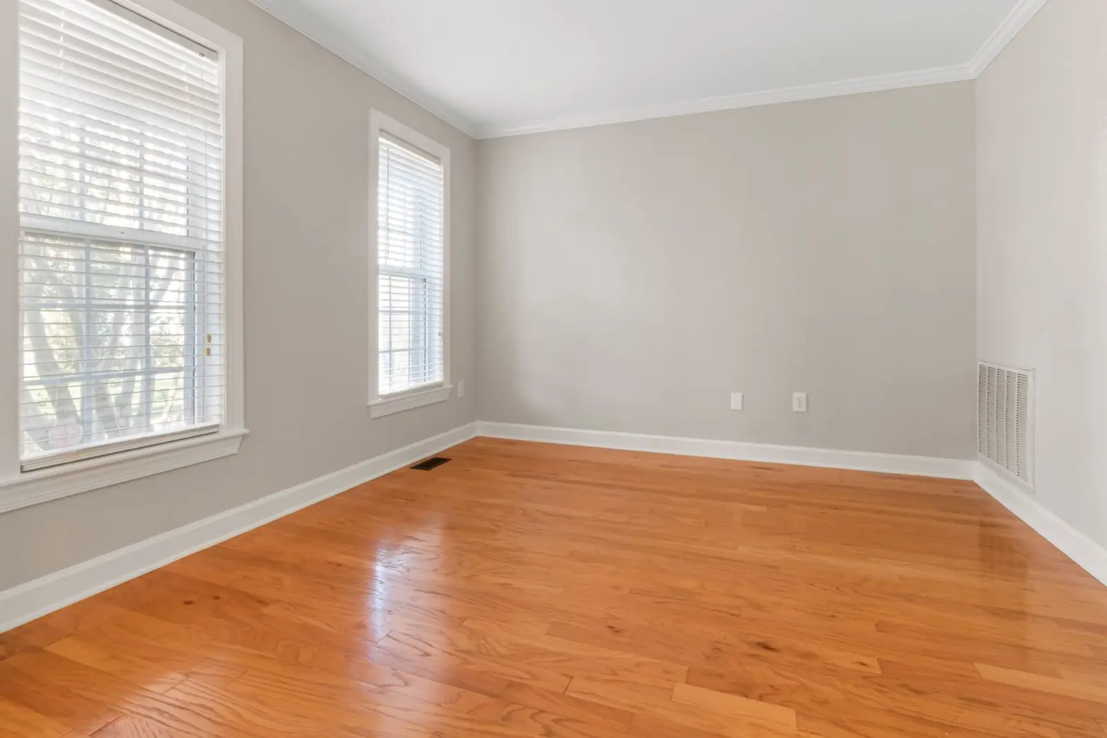 Empty room with hardwood floors, edited version